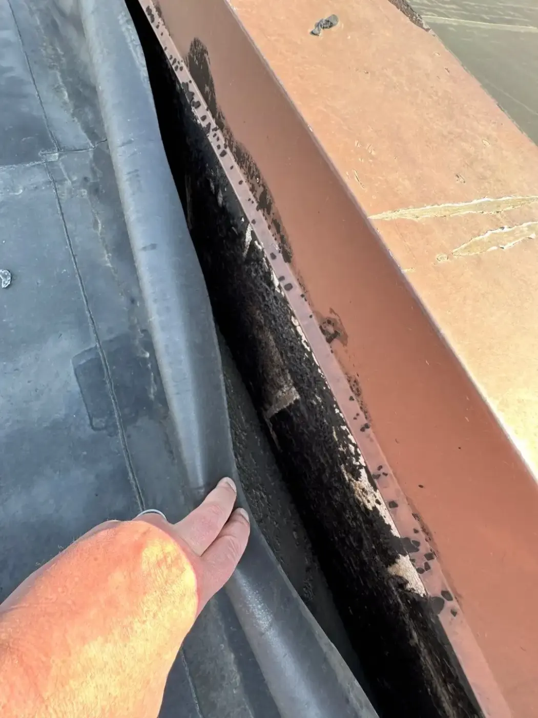 Tarping and dry-in on a Wanamaker commercial roof